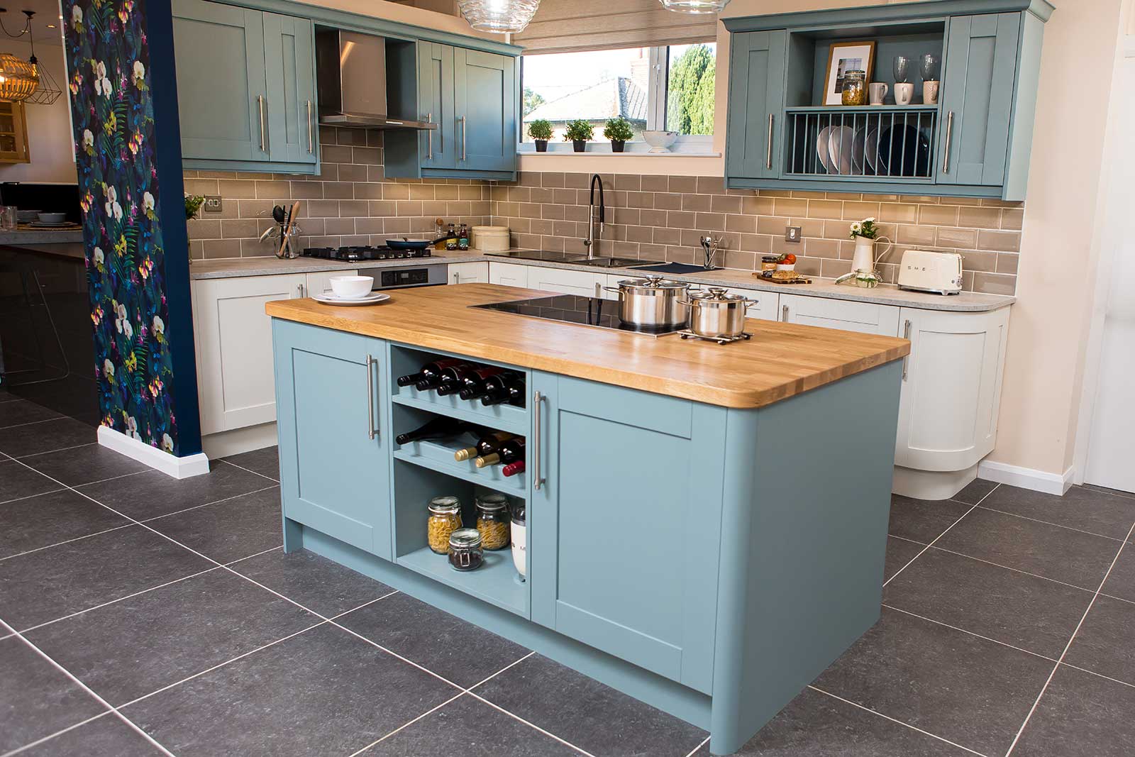 Shaker style kitchen, with plate racks and wine bottle storage in Norfolk kitchen showroom